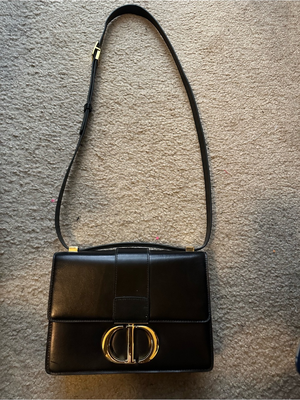 Black Leather Shoulder Bag with Gold Accent